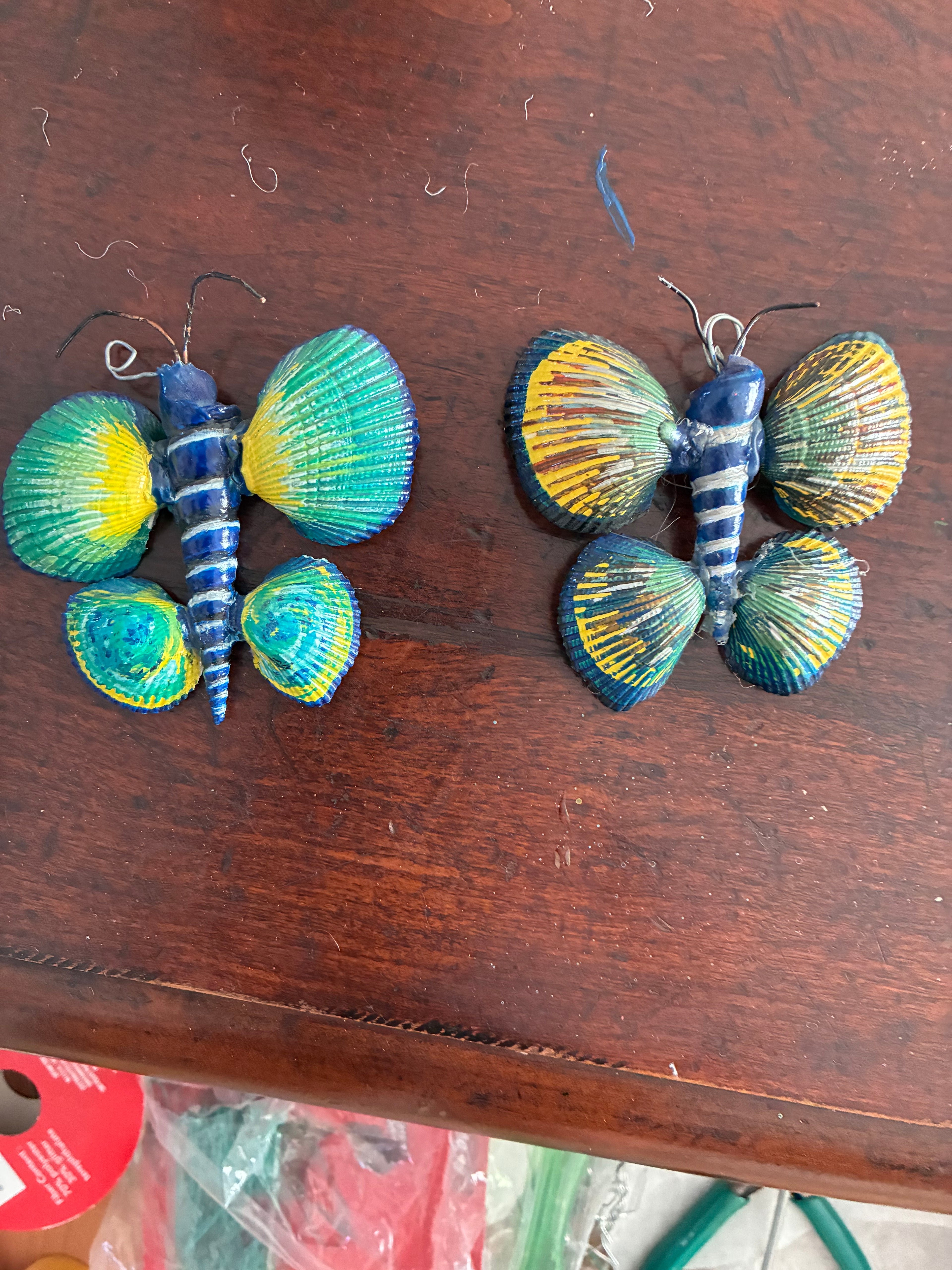2 butterflies made out of shells